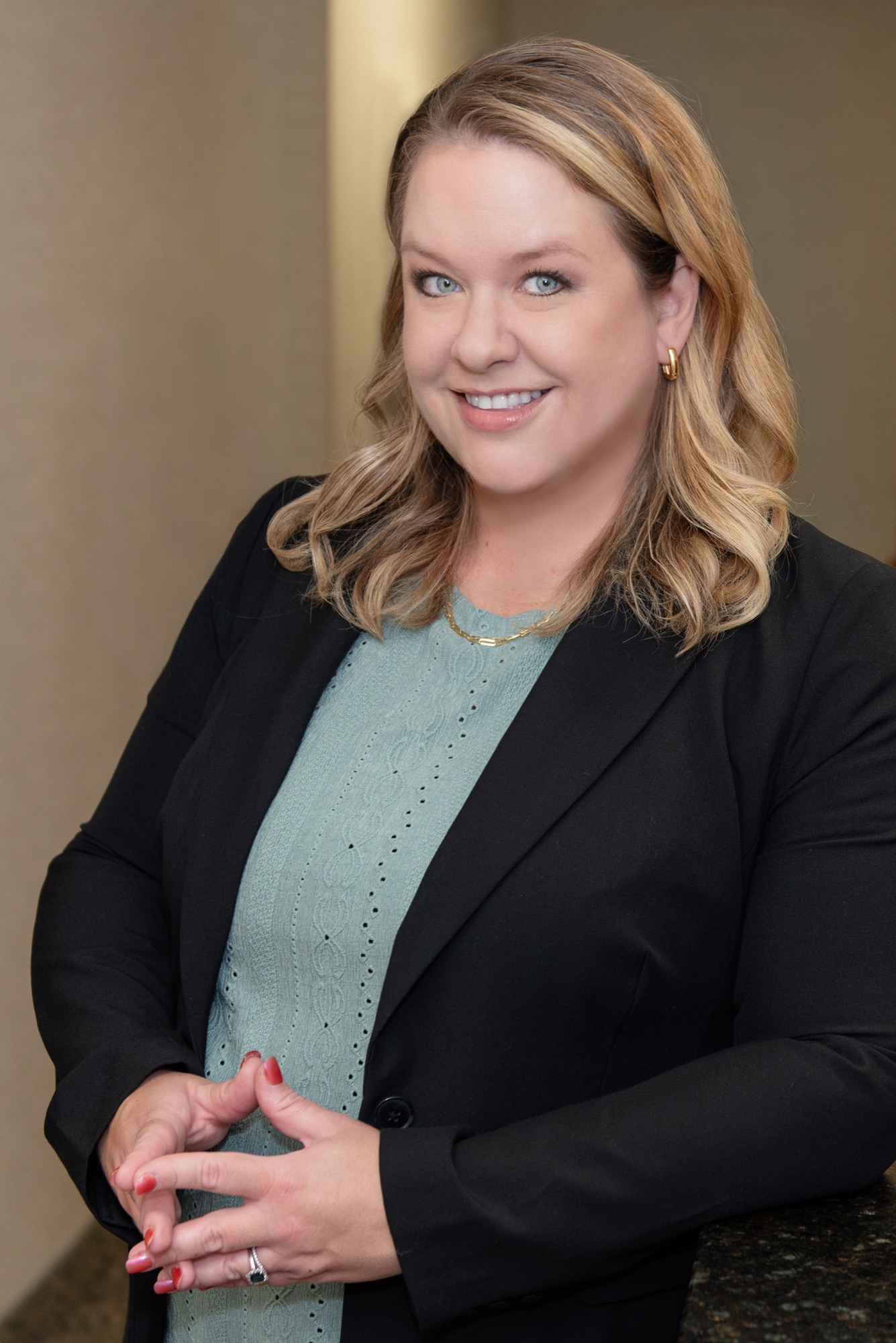 Studio portrait of Dr. Julia Lokitis, DDS, owner and dentist at Northern Virginia Dental Solutions