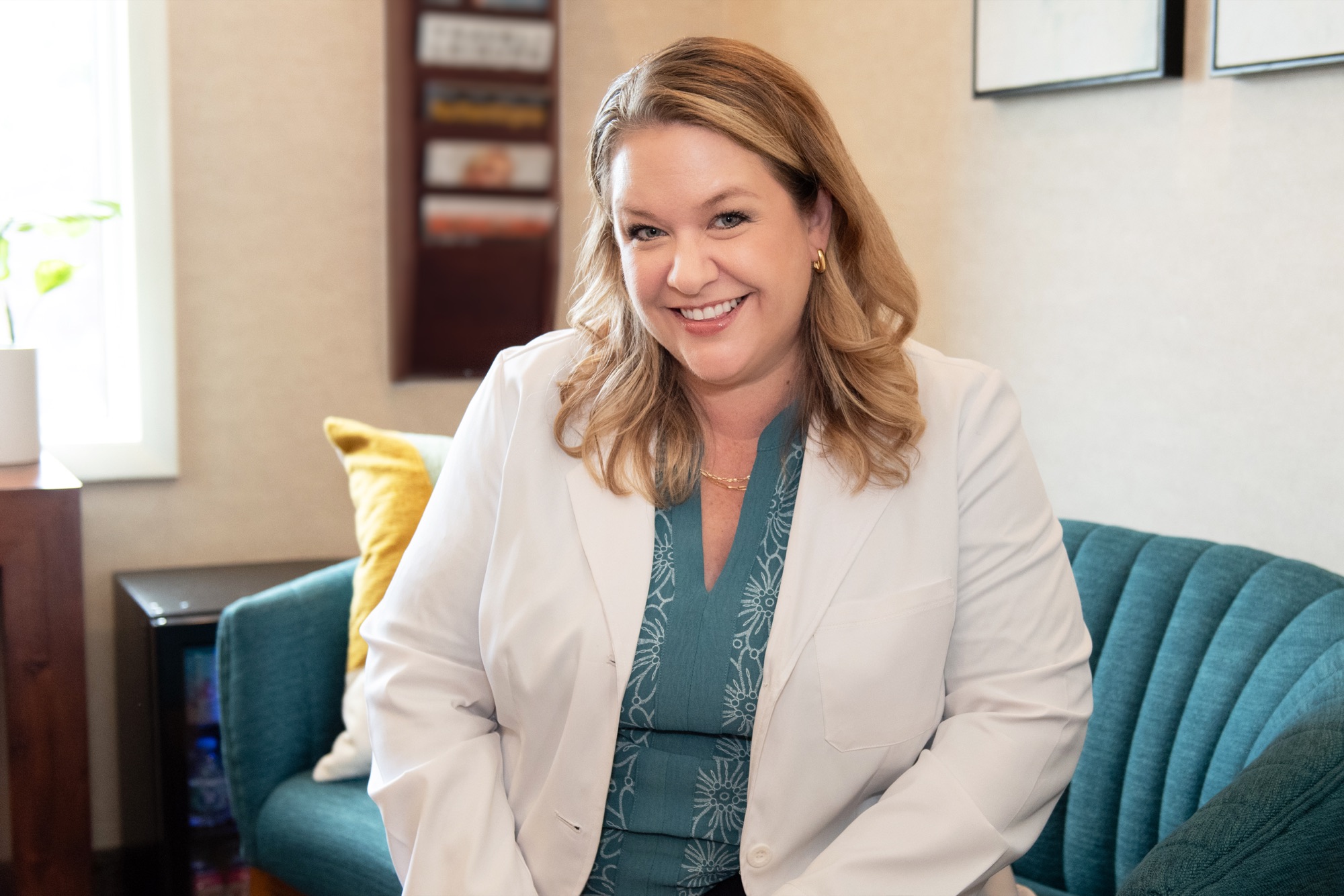 Dr. Julia Lokitis seated in the consultation room at Northern Virginia Dental Solutions in Vienna, Virginia